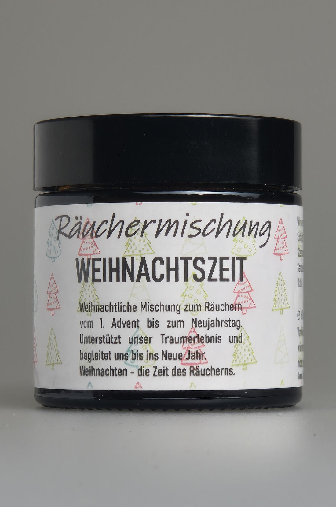 Räuchermischung Weihnachtszeit in schwarzer Dose mit Etikett und winterlicher Bezeichnung