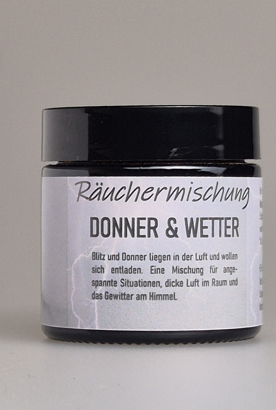 Räuchermischung Donner &amp; Wetter in schwarzer Dose mit Etikett und Produktnamen