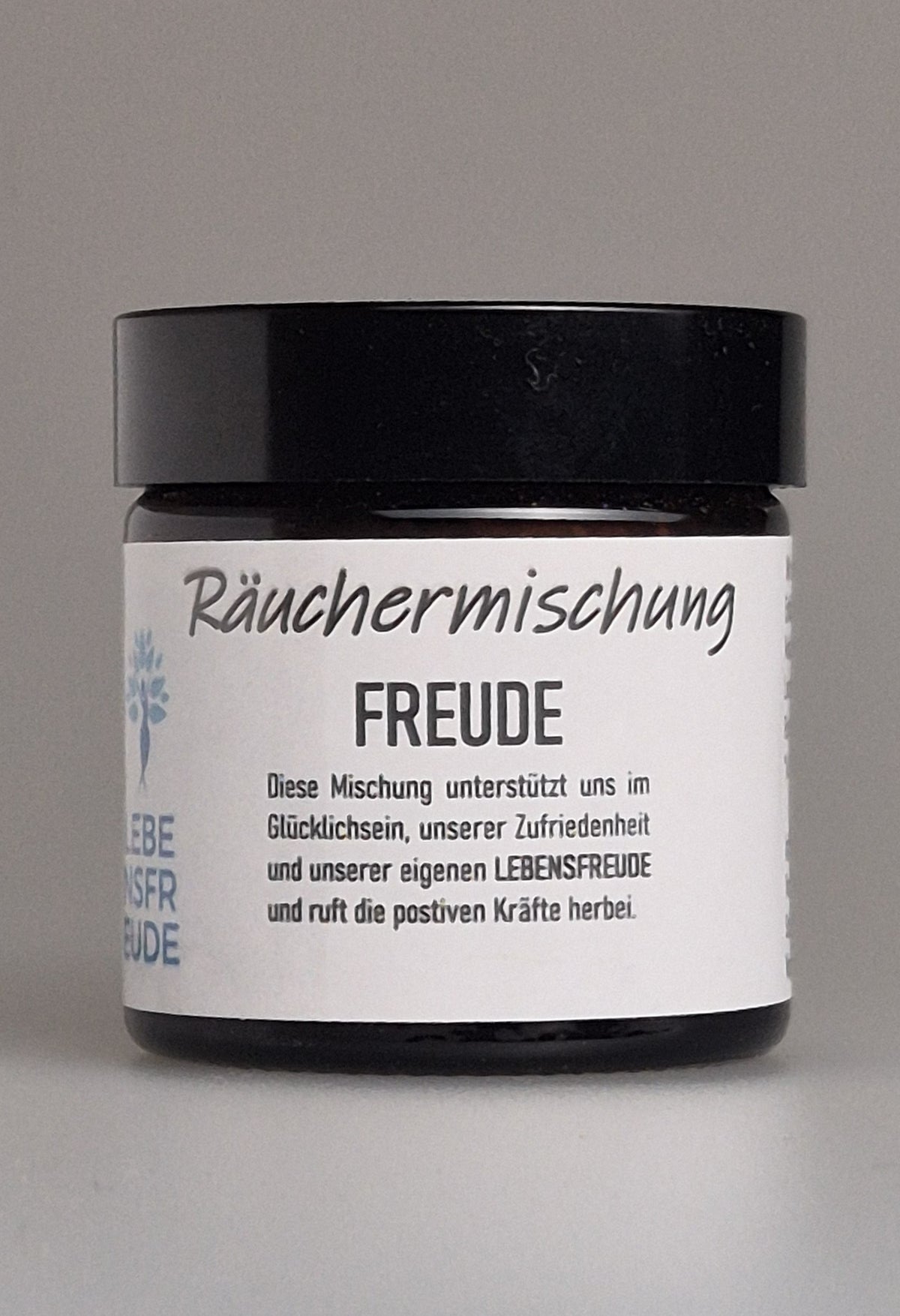 Räuchermischung Freude in schwarzer Dose mit Etikett und Produktnamen